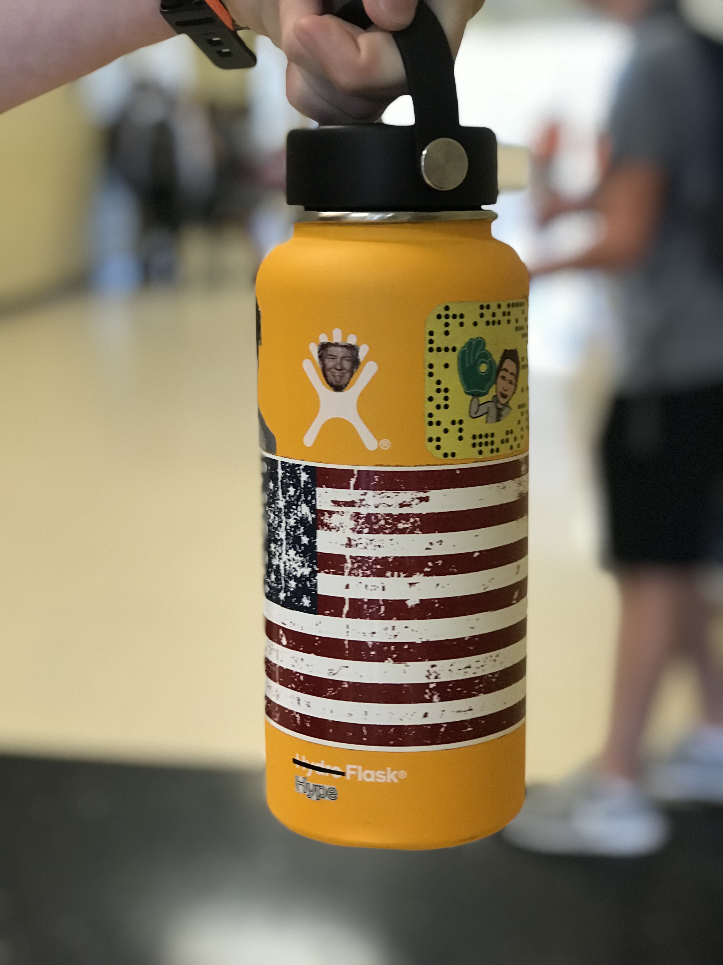 hydro flask with yellow stickers